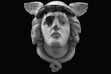 Black and white image of antique god of commerce, merchants and travelers Hermes (Mercury). He is olympic gods messenger with wings on his feet and helmet. 