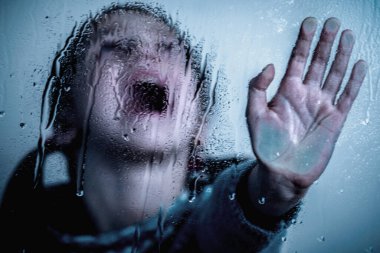 Stop gesture. Angry young child girl  showing NO gesture with her hand.