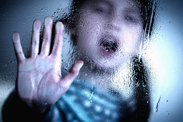 Portrait of young child girl showing STOP gesture with her hand. Concept of domestic violence and child abuse. 