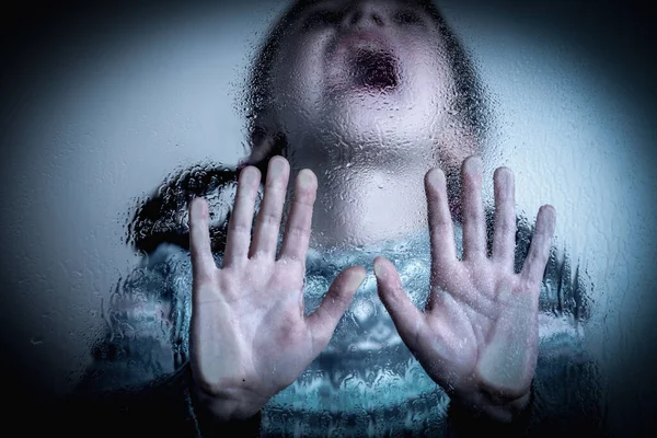 Close up of young girl stretching hand and protesting against domestic violence. Teen child stands against discrimination and child abuse.