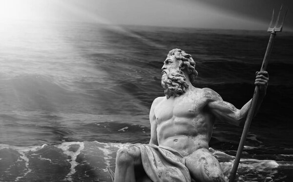 A formidable and powerful god of the sea and oceans Neptune (Poseidon). Fragment of ancient statue. Black and white image.