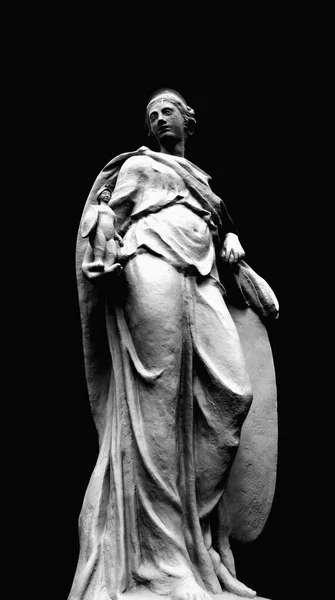 Goddess of wisdom and victory Athena isolated on black background. She holds the winner\'s warrior in her hand. Black and white image.
