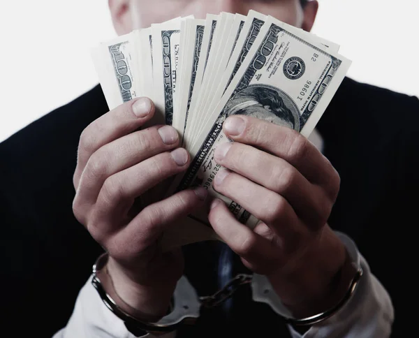 Arrested Man Holding Money Handcuffs Symbol Corruption Illegal Gratuities Horizontal — Stock Photo, Image