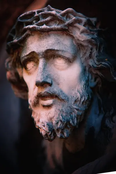 Antique statue the suffering of Jesus Christ. Good, faith, religion concept. Vertical image.
