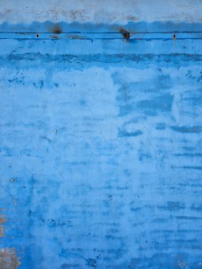 Pürüzlü soluk mavi beton duvar yüzey deseni dokusu, soyulmuş arka plan