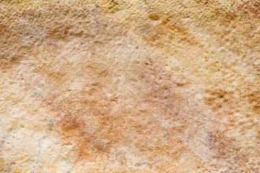 Taş arka plan dokusu. Yaşlı bej taş duvar ya da zemin, kaya deseni