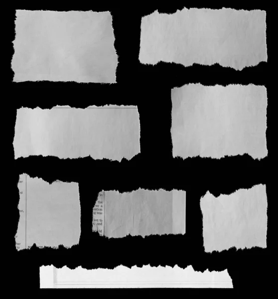 黑色背景的八张撕破的报纸 — 图库照片