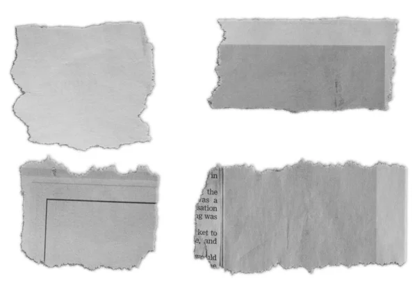Düz Arkaplanda Dört Parça Yırtık Kağıt — Stok fotoğraf