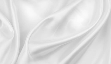 Dalgalı beyaz ipek kumaş dokusu.