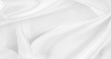 Dalgalı beyaz ipek kumaş dokusu.