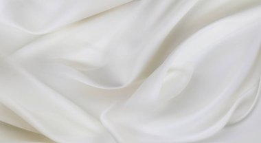 Dalgalı beyaz ipek kumaş dokusu.
