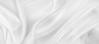 Dalgalı beyaz ipek kumaş dokusu.