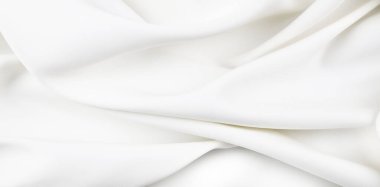 Dalgalı beyaz ipek kumaş dokusu.