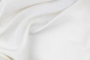 Dalgalı beyaz ipek kumaş dokusu arka planı. Boşluğu Kopyala