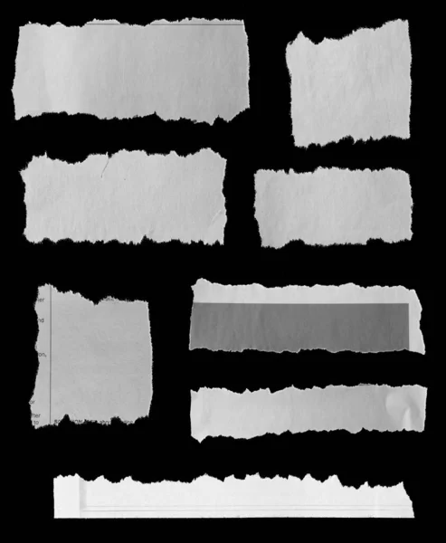 Οκτώ Κομμάτια Σκισμένης Εφημερίδας Μαύρο Φόντο — Φωτογραφία Αρχείου