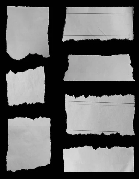 Επτά Κομμάτια Σκισμένης Εφημερίδας Μαύρο Φόντο — Φωτογραφία Αρχείου