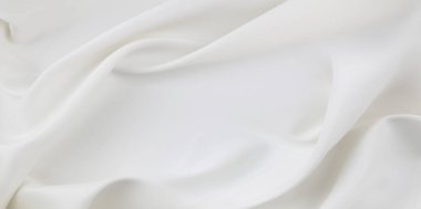 Dalgalı beyaz ipek kumaş dokusu.