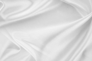 Dalgalı beyaz ipek kumaş dokusu.