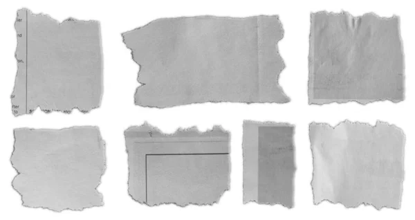Sieben Stücke Zerrissenes Papier Auf Blankem Hintergrund — Stockfoto