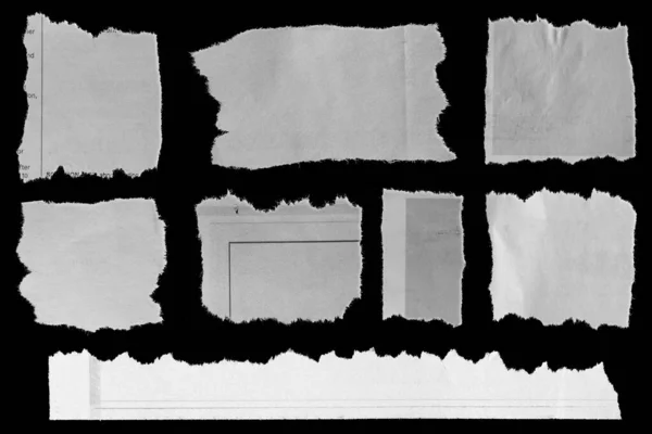 Eight Pieces Torn Newspaper Black Background — Stock Photo, Image