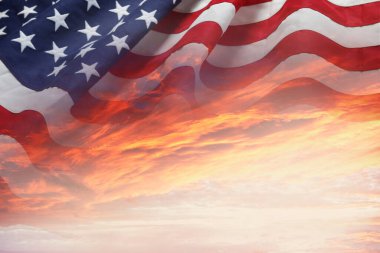 American flag in sunny sky