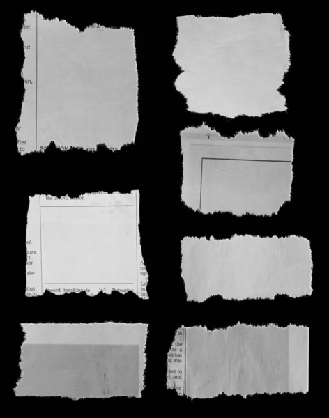 黑色背景的七张撕破的报纸 — 图库照片