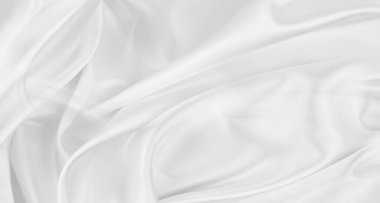 Dalgalı beyaz ipek kumaş dokusu.