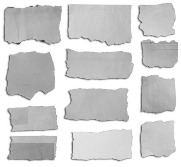 Zwölf Stücke Zerrissenes Papier Auf Weißem Hintergrund — Stockfoto