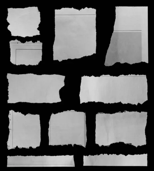 Eleven Pieces Torn Newspaper Black Background Stock Photo
