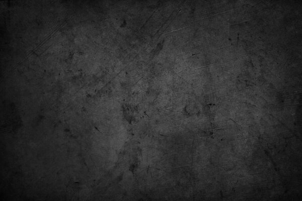 Dark grey textured concrete wall background