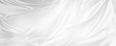 Dalgalı beyaz ipek kumaşın yakın çekimi