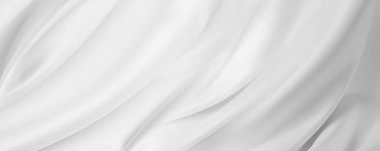 Dalgalı beyaz ipek kumaşın yakın çekimi