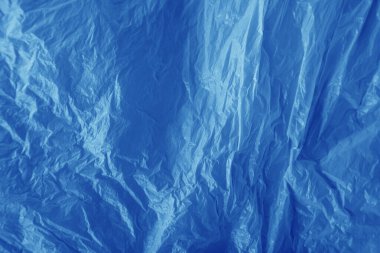 Kırışık mavi plastik arka plan yakın plan