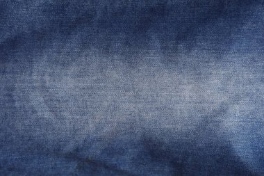 Mavi kot pantolonun yakın plan kumaş dokusu