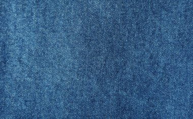 Mavi kot pantolonun yakın plan kumaş dokusu