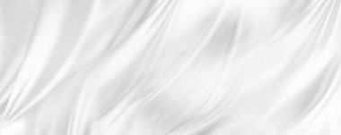 Dalgalı beyaz ipek kumaşın yakın çekimi