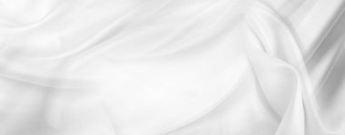 Dalgalı beyaz ipek kumaşın yakın çekimi