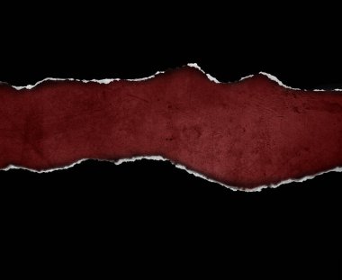 Kırmızı arkaplanda yırtılmış siyah kağıt