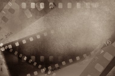 Film negatifleri kahverengi arka grubunu çerçeveler
