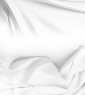 Dalgalı beyaz ipek kumaşın yakın çekimi