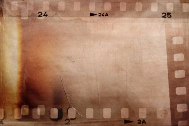 Film negatifleri kahverengi arka grubunu çerçeveler