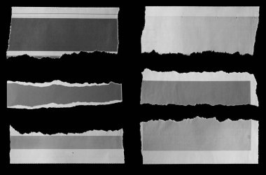 Siyah arka plan üzerinde yırtık gazetesinin altı parça