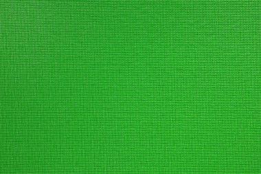 Yeşil tül kumaş dokusunun ayrıntılı görünümü.