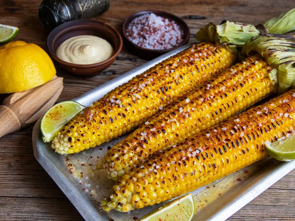 Three Heads Yellow Corn Grilled Lemon Lime Spicy White Sauce Stock Picture