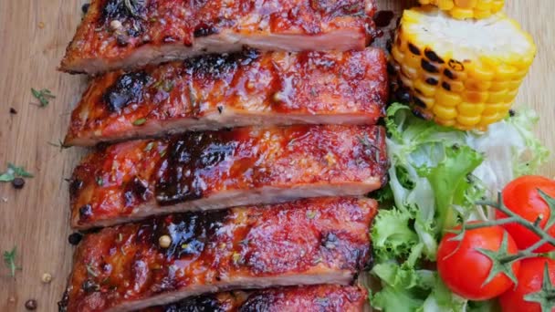 Cooked Sliced Juicy Pork Ribs Vegetables Wooden Board Close — Stock Video
