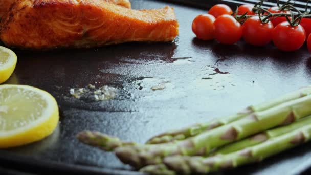 Cooking Fillet Salmon Fish Asparagus Tomato Lemon Grill — Stock Video