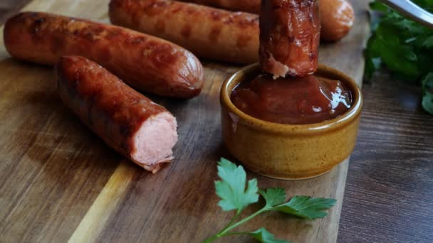 Grilled Sausages Bockwurst Dipped Red Sauce Close Slow Motion — Stock Video