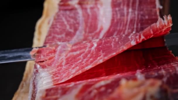 Cutting Slicing Traditional Iberico Spanish Ham Jamon Whole Leg Close — Stock Video