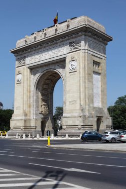 BUCHAREST, ROMANIA - June 24, 2023: The monumental Triumphal Arch in Bucharest is a significant landmark in Romania. clipart