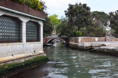 Venice, Italy - April 30 2019: Away from the crowds of tourists, Venice boasts many beautiful neighborhoods and parks to explore. clipart